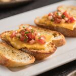 Hot Cheesy Bruschetta Spread with Toasted Baguette Slices 2 Baguette Slices